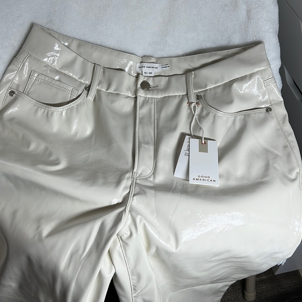 Off white faux leather pants. Brand new with tags. Amazing quality.